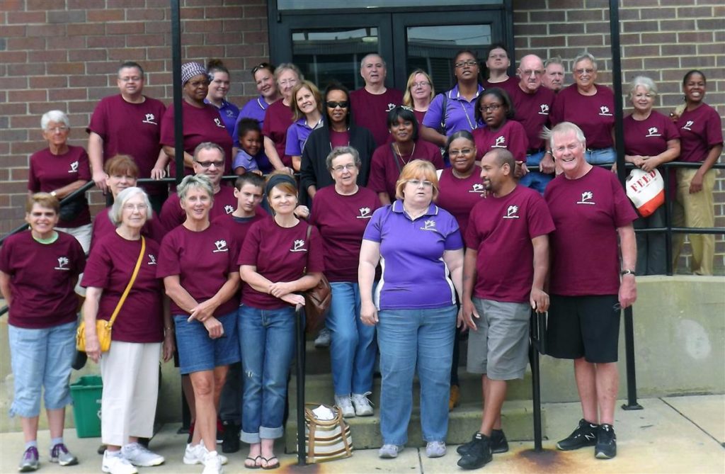 Shirley Wilhelm (third row from bottom far left) joins other PCRC volunteers on an outing to Philabundance in 2013.